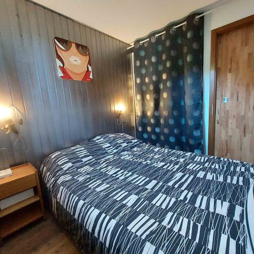 Chambre confortable dans un appartement en location au Grand-Bornand, géré par la conciergerie Les Clefs en Main